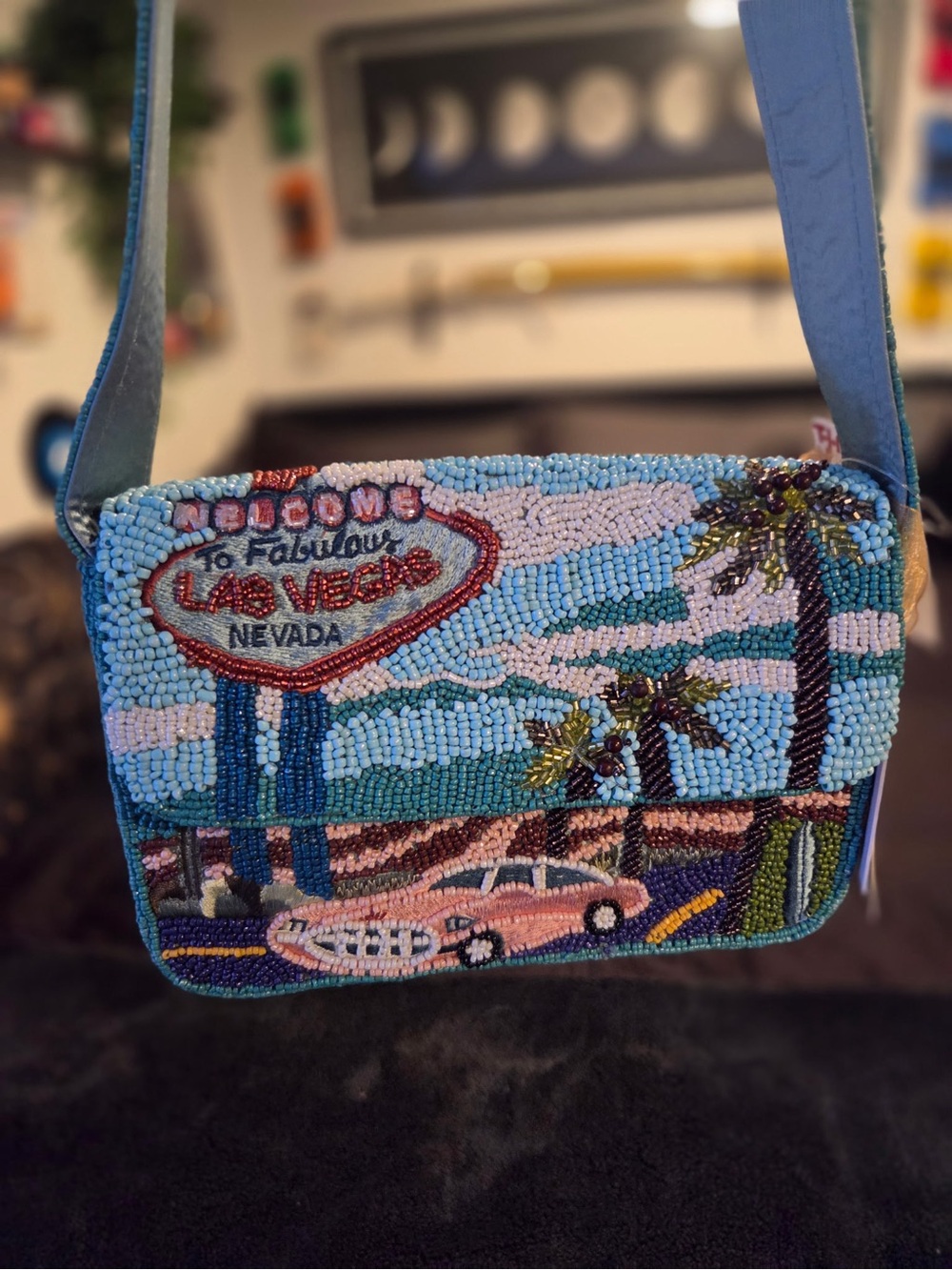 Las Vegas beaded purse with 'Welcome to Fabulous Las Vegas Nevada' sign, palm tr